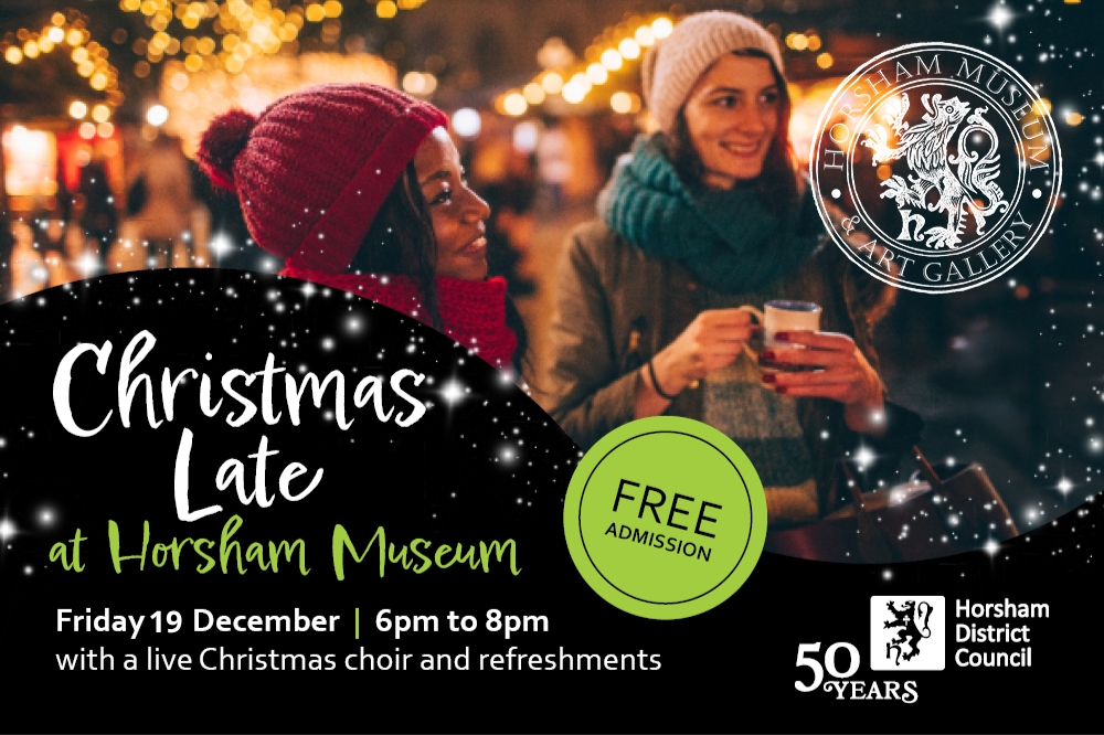 Image of two women against a background of Christmas lights