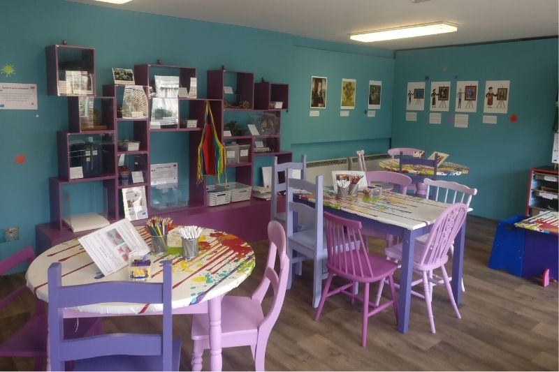 Tables set up in the Children's Art Zone
