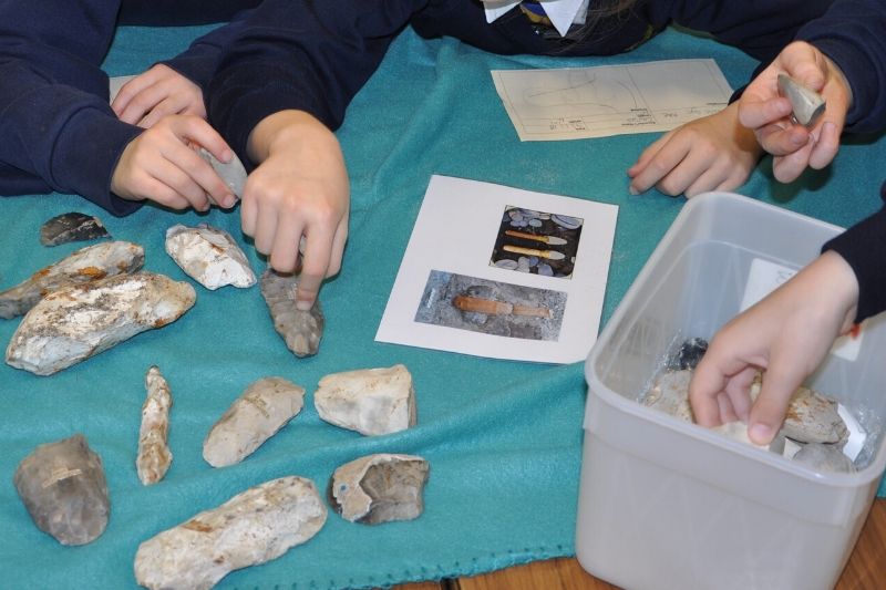 Children work together on a flints activity