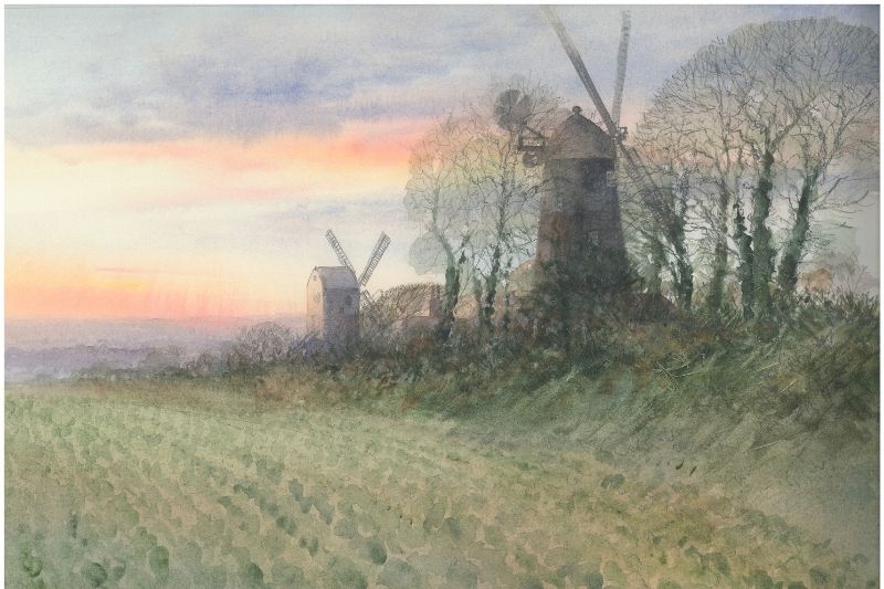 A picture of Jack and Jill windmills in Sussex surrounded by fields, by artist Gordon Rushmer