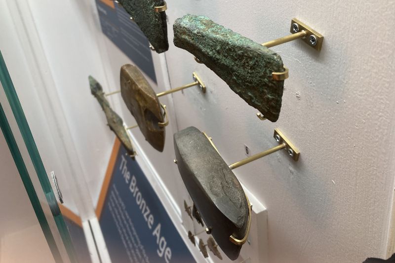 Bronze Age axe heads Displayed in their mounts