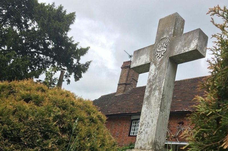 A memorial cross to Walter Budd, who died in the 1890s