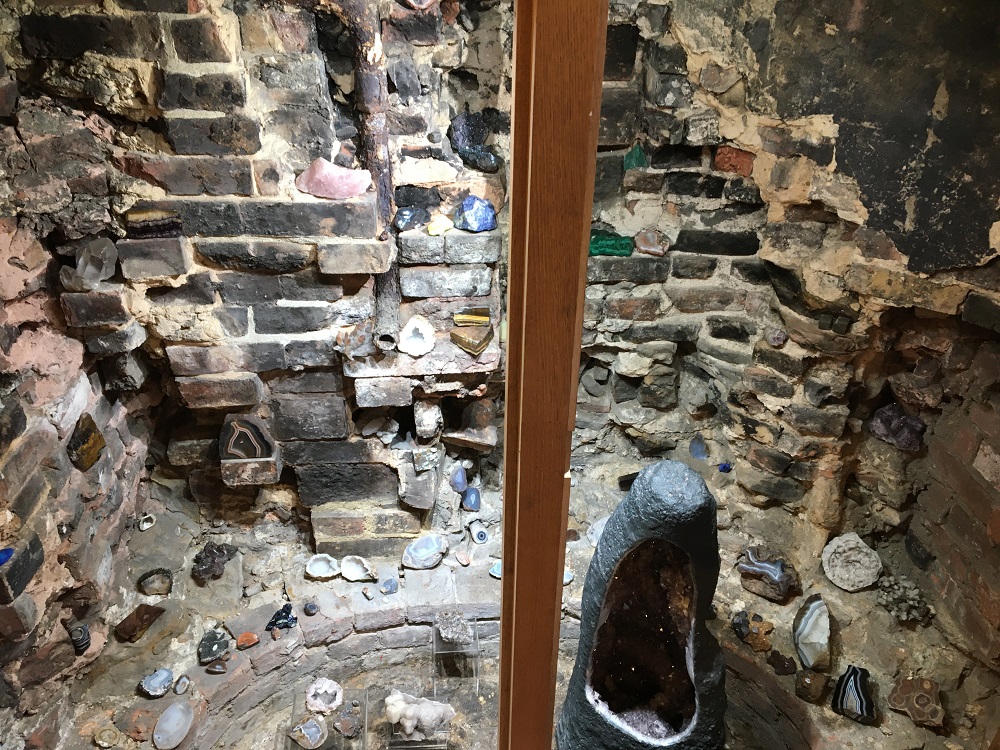 Crystal geodes displayed in the Museum's historic fireplace