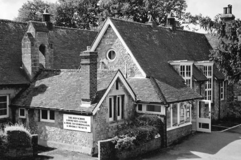 Black and white image of an old school house